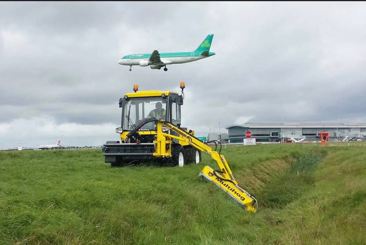 Airport perimeter grounds mowing